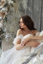 Fairy tale woman princess in long white dress. Perfect bride, portrait of a girl. Beautiful hair and clean delicate skin. Wedding Royalty Free Stock Photo