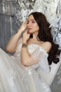 Fairy tale woman princess in long white dress. Perfect bride, portrait of a girl. Beautiful hair and clean delicate skin. Wedding Royalty Free Stock Photo