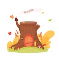 Fairy tiny forest house in the stump tree. Royalty Free Stock Photo