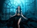 Fairy woman elf queen in black fantasy sexy dress, dark magic smoke flutter waving flowing around witch. Black long hair