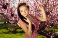 Fairy young girl in blossomy garden Royalty Free Stock Photo