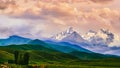 Fairytale dawn, sunset with bright multi-colored clouds, against the backdrop of a mountain range with snowy peaks and bright gree