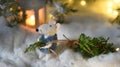 A fairytale rat in a fur coat carries a Christmas tree from a magical fairytale forest lit by lanterns. Magical New Year Christmas Royalty Free Stock Photo