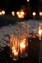 Fairytale romantic wedding aisle with white candles and petals i Royalty Free Stock Photo