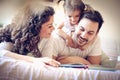 Fairytale time. Happy family with one child. Royalty Free Stock Photo