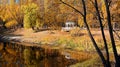 Fairytale View Of Lake In Autumn Park With Beautiful Gazebo On The Shore Overgrown With Reeds