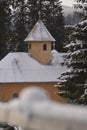 Fairytale winter scenery with snow covered pine trees and forest on the picturesque hills. Bucegi mountains