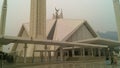 Faisal Mosque with mountains and peoples