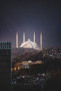 Faisal Mosque peeking out from behind the shakarparian hills