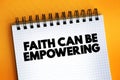 Faith Can Be Empowering text on notepad, concept background Royalty Free Stock Photo