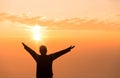 Faith of christian concept. Spiritual prayer hands over sun shine with blurred beautiful sunset background. Female hands worship Royalty Free Stock Photo