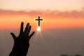 Faith of christian concept. Spiritual prayer hands over sun shine with blurred beautiful sunset background. Female hands worship Royalty Free Stock Photo