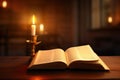 Faith in Focus: Open Holy Bible and Lit Candle.