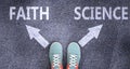 Faith and science as different choices in life - pictured as words Faith, science on a road to symbolize making decision and