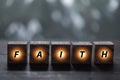 Faith symbol. Turned wooden cube with words Faith. Beautiful bokeh background. Business and Faith concept. Copy space