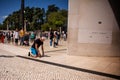 Faithful advancing on their knees in the square of the Sanctuary of Fatima, Portugal