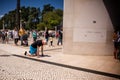 Faithful advancing on their knees in the square of the Sanctuary of Fatima, Portugal