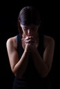 Faithful athletic woman praying