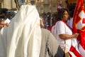 Faithful Catholics are standing waiting for the Mass to celebrate the day of Corpus Christ