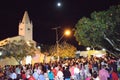 Faithful celebrating in front of the church