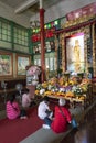 Faithful pray in a temple in Bangkok