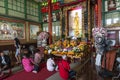 Faithful pray in a temple in Bangkok