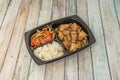 fajita takeout tray fusion chicken in teriyaki sauce with white rice and strips Royalty Free Stock Photo