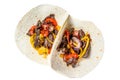 Fajitas with beef meat stripes, colored bell pepper and onions, served with tortillas and salsa. Isolated on white
