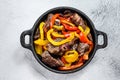 Fajitas beef meat traditional Mexican food dish in a pan. White background. Top view