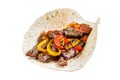 Fajitas Tortilla wraps with beef meat steak stripes, sweet pepper and onions. Isolated on white background, Top view. Royalty Free Stock Photo