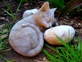 Fake cat slepping on the ground Royalty Free Stock Photo