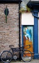 Fake Doorway and Stairs with Bicycle at Butcher Shop in Hay-on-Wye