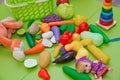 Fake fruits and vegetables .Plastic childrens toys in the form of fruit and vegetables . Toy fruits and grasszs