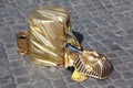 Fake golden mask pharaoh lies on pavement Royalty Free Stock Photo