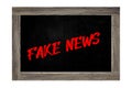 Fake News - chalkboard concept. The inscription on a chalkboard `Fake News` Royalty Free Stock Photo