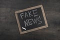 fake news concept with blackboard top view. High quality photo Royalty Free Stock Photo