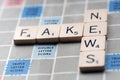 Fake News - Concept of Fake News on a Scrabble Board.