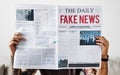 Fake news headline on a newspaper Royalty Free Stock Photo