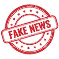 FAKE NEWS text on red grungy round rubber stamp Royalty Free Stock Photo