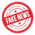 FAKE NEWS text on red round grungy stamp Royalty Free Stock Photo