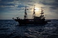 Fake pirate cruise ship for tourists during sunset in the harbour in Thessaloniki