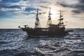 Fake pirate cruise ship for tourists during sunset in the harbour in Thessaloniki