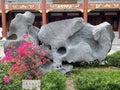 Fake rocks and flower mirrors in a Chinese garden