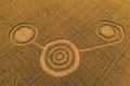 Fake UFO circles on grain crop yellow field, aerial view from drone Royalty Free Stock Photo