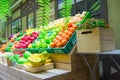 Fake vegetables and fruits on shelves