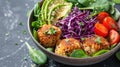 Falafel quinoa salad bowl with fresh vegetables and avocado