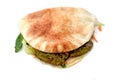Falafel sandwich, a very popular and traditional Egyptian food, a warm pita bread stuffed with crispy hot falafel balls surrounded