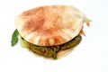 Falafel sandwich, a very popular and traditional Egyptian food, a warm pita bread stuffed with crispy hot falafel balls surrounded