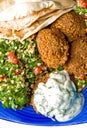 Falafel and tabbouleh Royalty Free Stock Photo