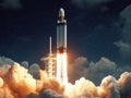 Falcon Heavy rocket launches into space. Powerful thrust propels spacecraft into orbit. Final mission to explore universe. Royalty Free Stock Photo